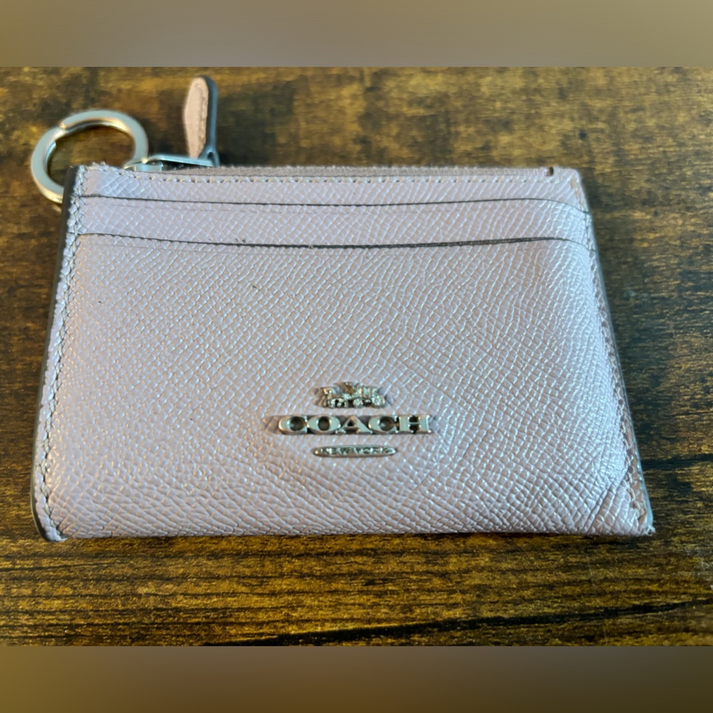 Dusty purple coach small size wallet. USED